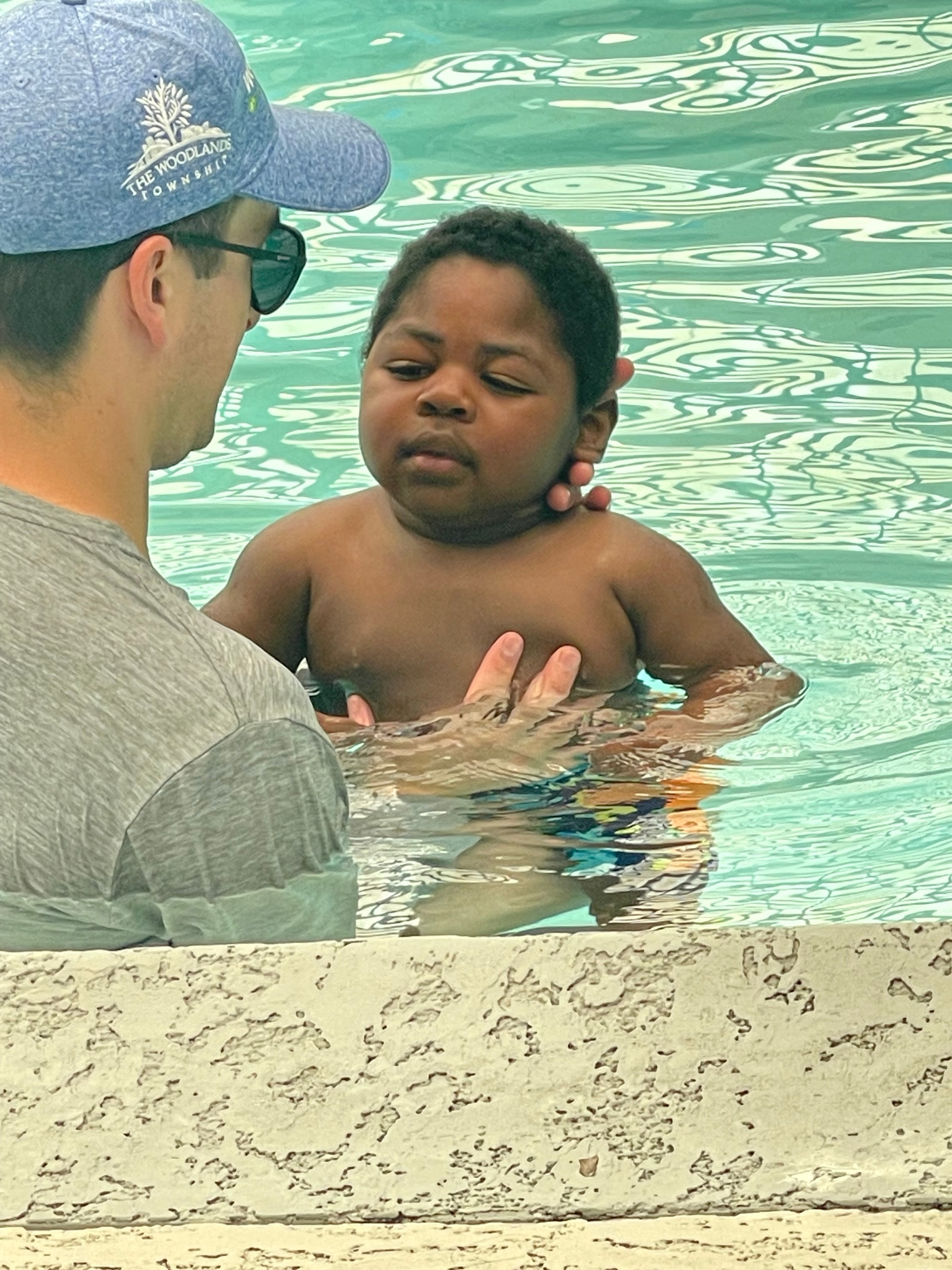 Myles in the pool during aquatic therapy